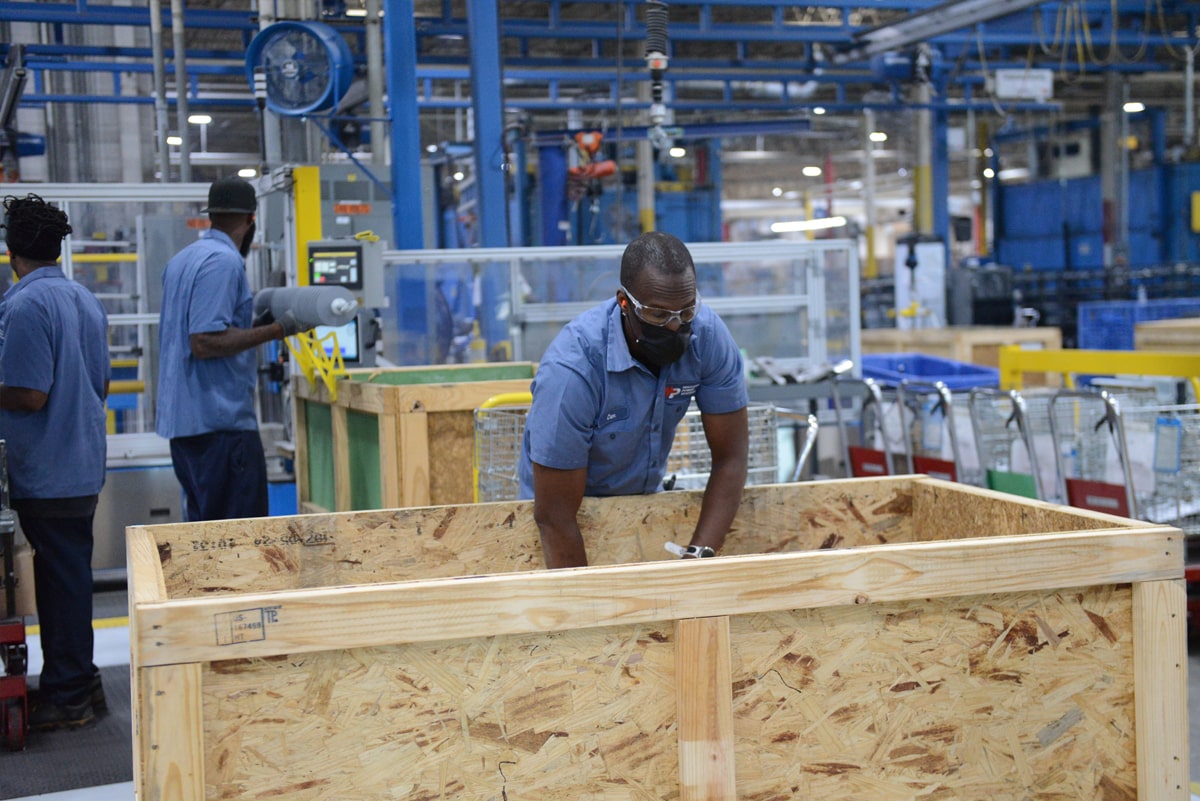 Smiling workers in factory