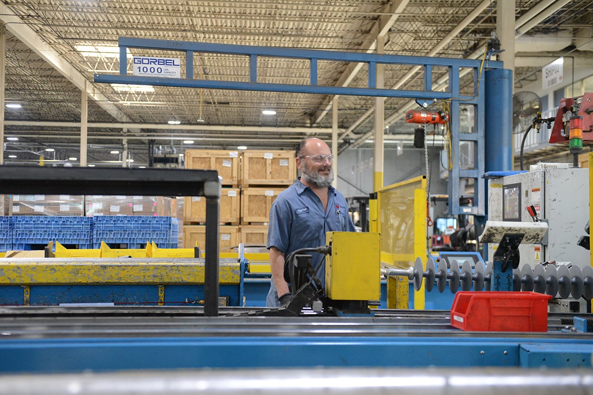 Smiling workers in factory